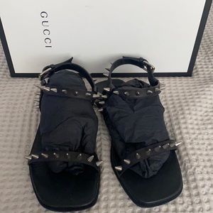 Spikes black leather sandals Gucci